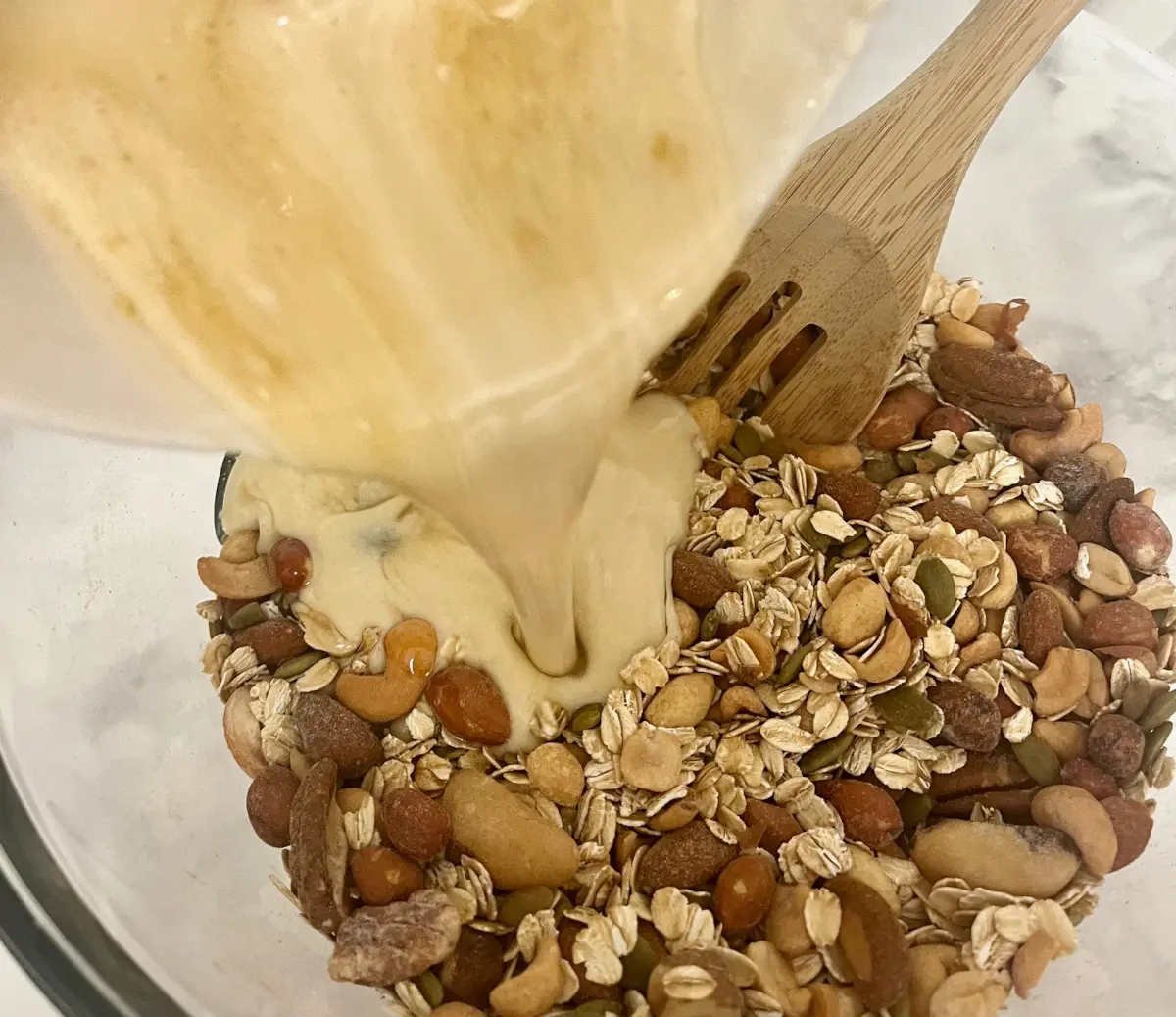 adding discard into granola mixture