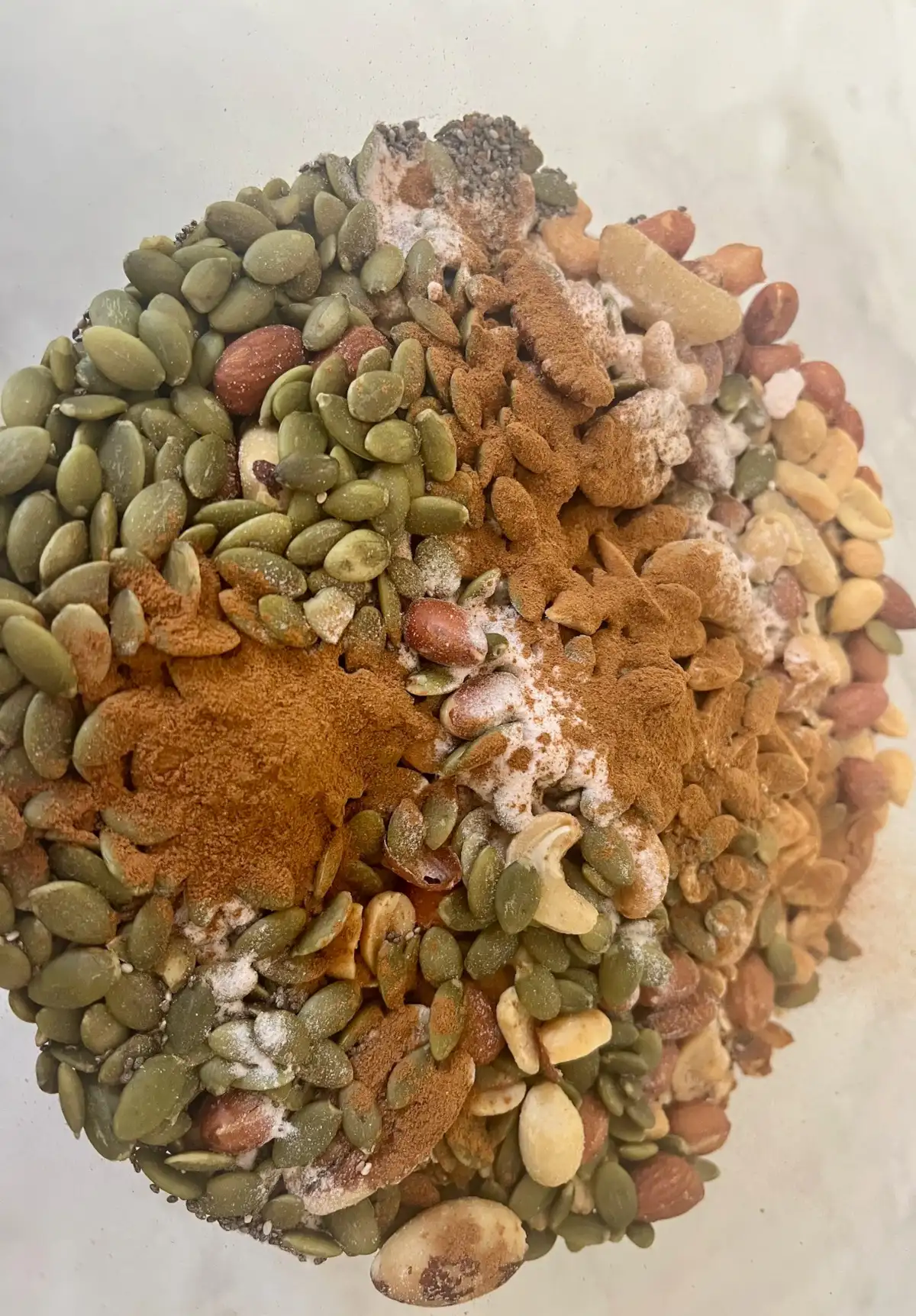 sourdough granola nuts and seeds mixed in a bowl.