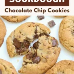 chocolate chunk sourdough cookies with the one in the middle broken in half showing the gooey chocolate in the middle