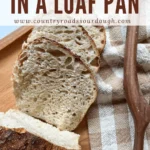 sliced sourdough bread from a loaf with a bow bread knife