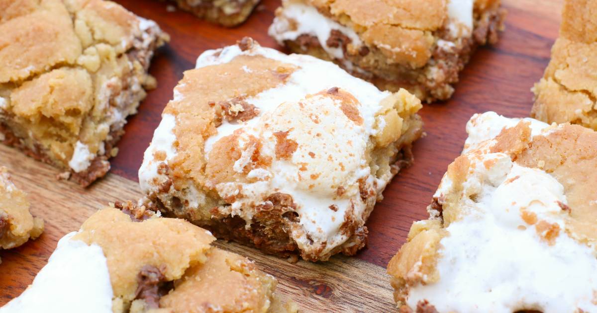 s'mores cookie bars on a wood platter