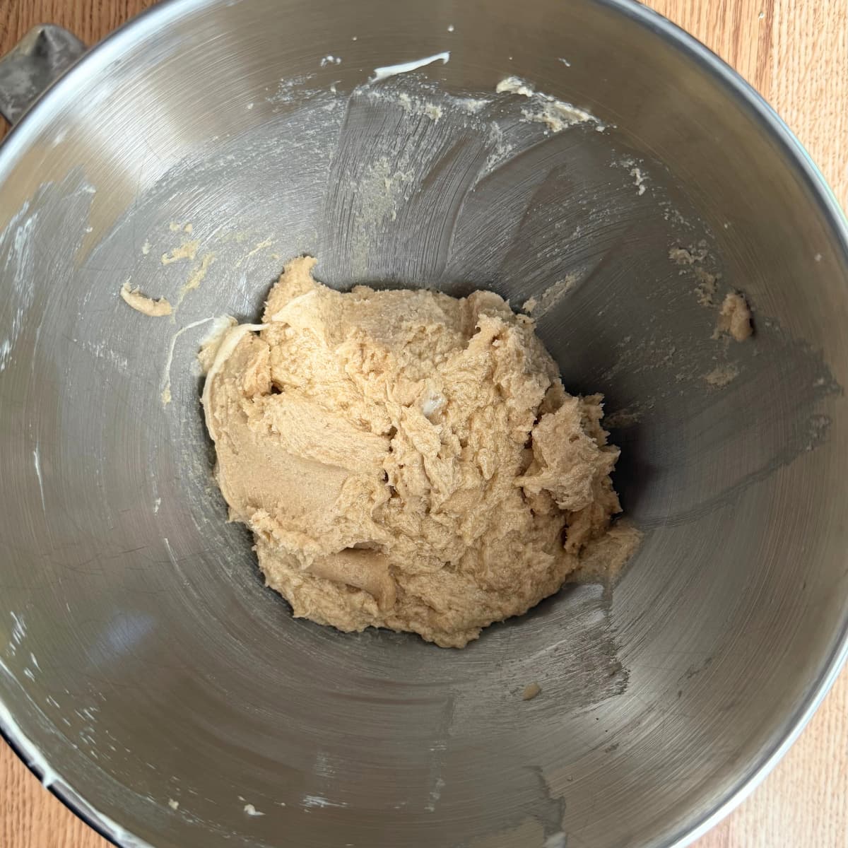wet ingredients for cookie dough mixed together in a mixing bowl.