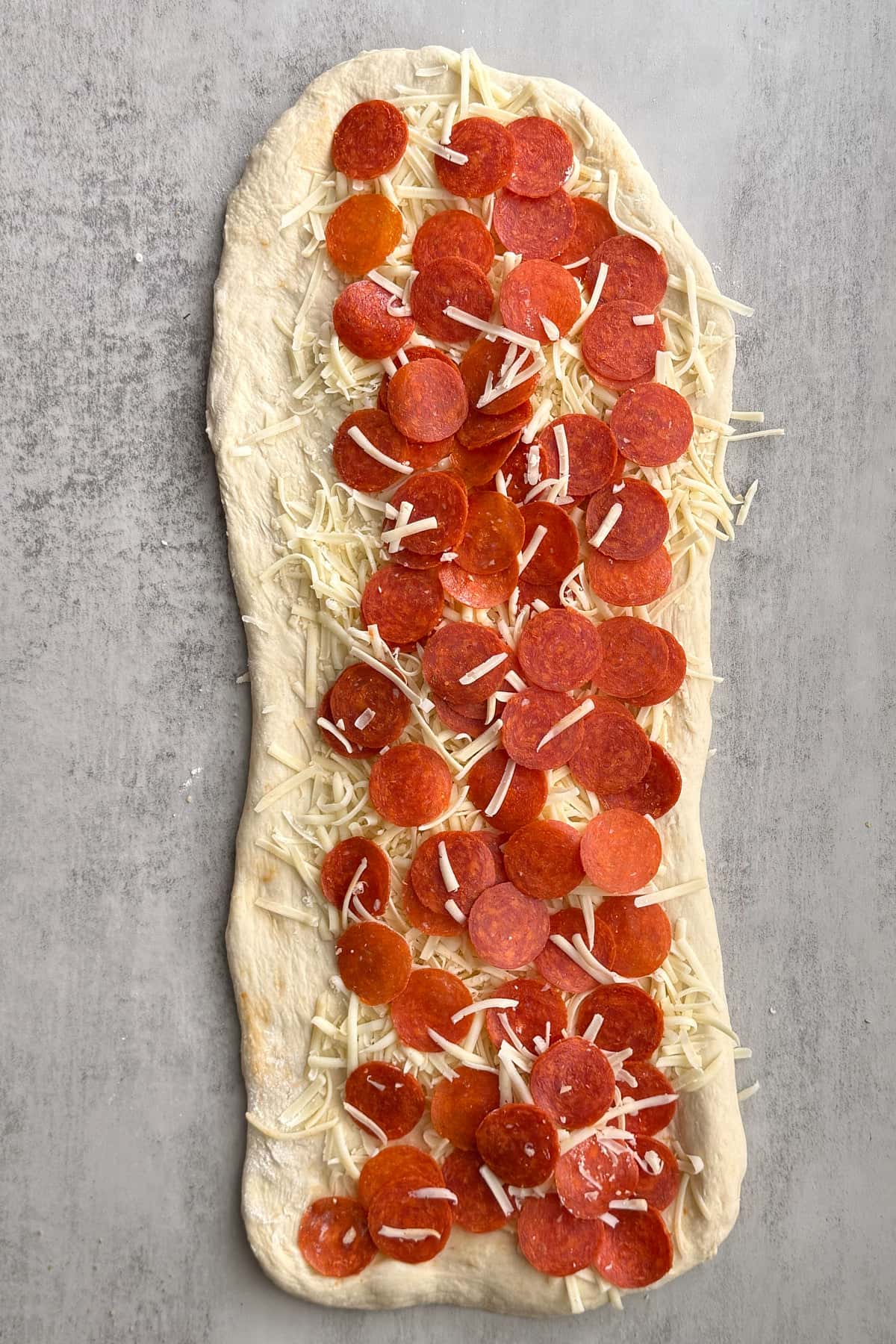 Toppings added to the sourdough pizza wreath dough.