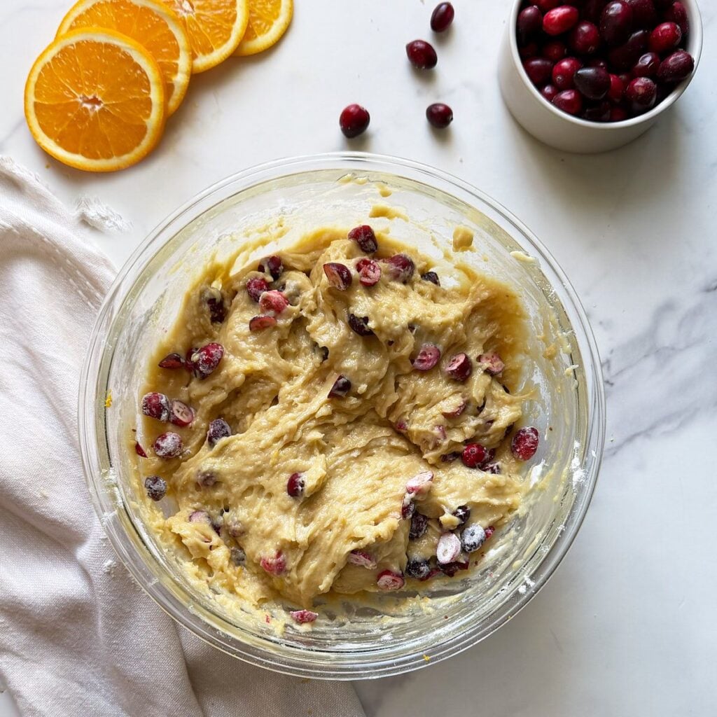 cranberries mixed into muffin batter