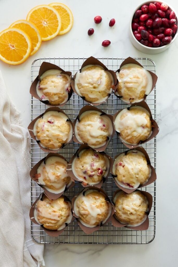 cranberry orange muffins cooling on wire rack