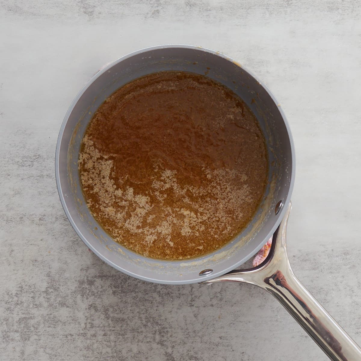 Caramel mixture in a pan.