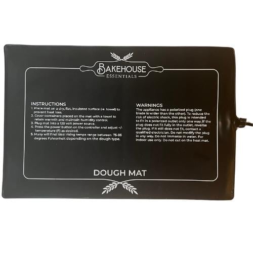 Black proofing mat on a white background. 