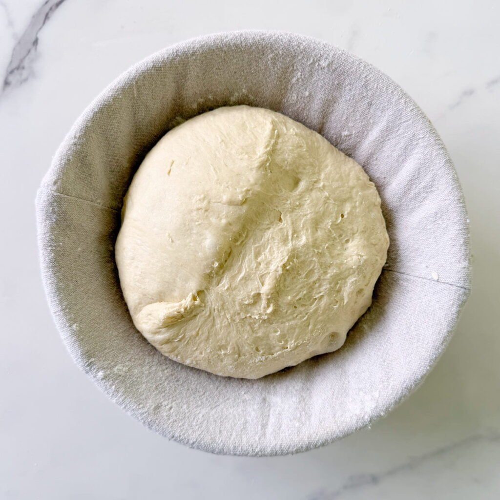 Dough in proofing basket for second rise.