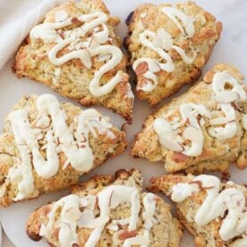 Sourdough White Chocolate Almond Scones with a white chocolate drizzle.