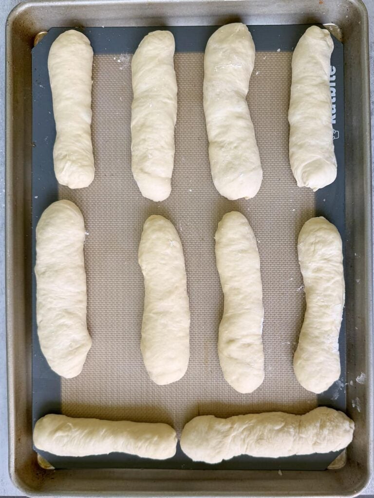 Sourdough hot dog buns before second rise.