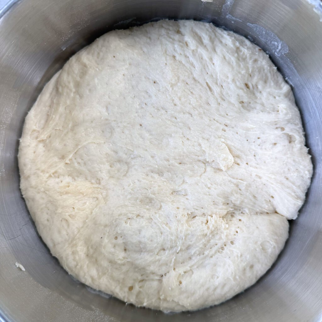 Cinnamon roll dough after first rise.