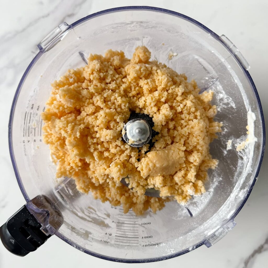 Dough for sourdough goldfish mixed in a food processor.