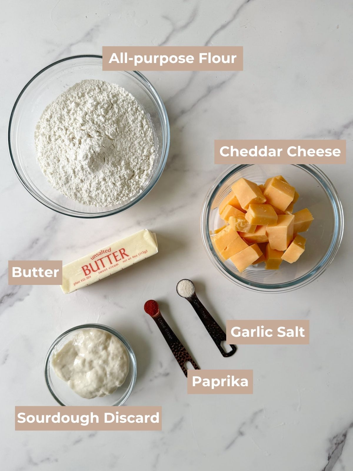 Ingredients for Sourdough Goldfish in clear bowls.