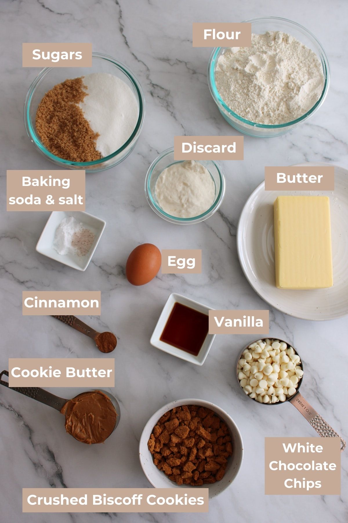 Ingredients for cookie butter sourdough cookies in small clear bowls.
