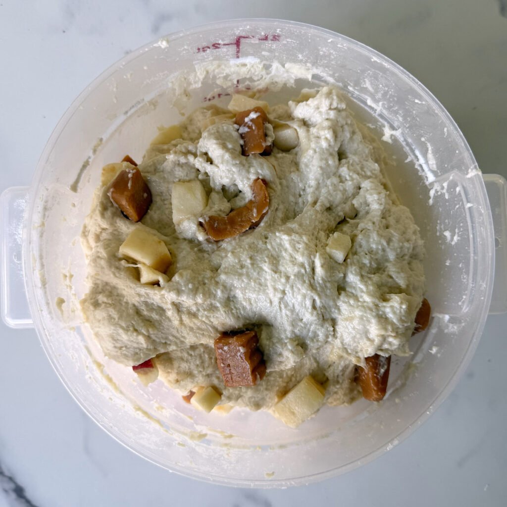 Caramel Apple Sourdough Focaccia dough with apples and caramels folded into the dough during stretch and folds.