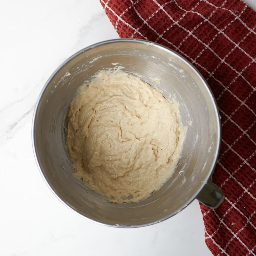 Dry ingredients added to the batter for Sourdough Apple Fritter Bread.