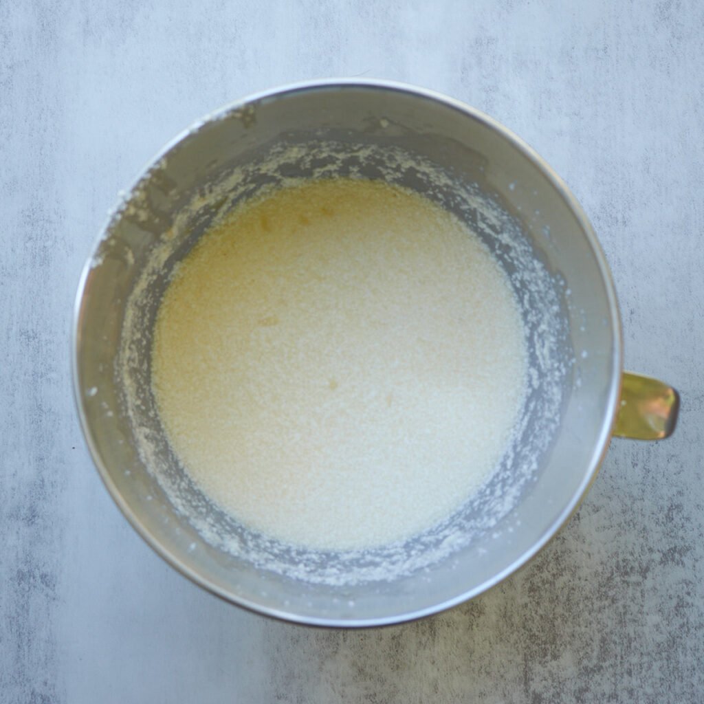 Wet ingredients added to the creamed butter and sugar for Sourdough Chocolate Cake.