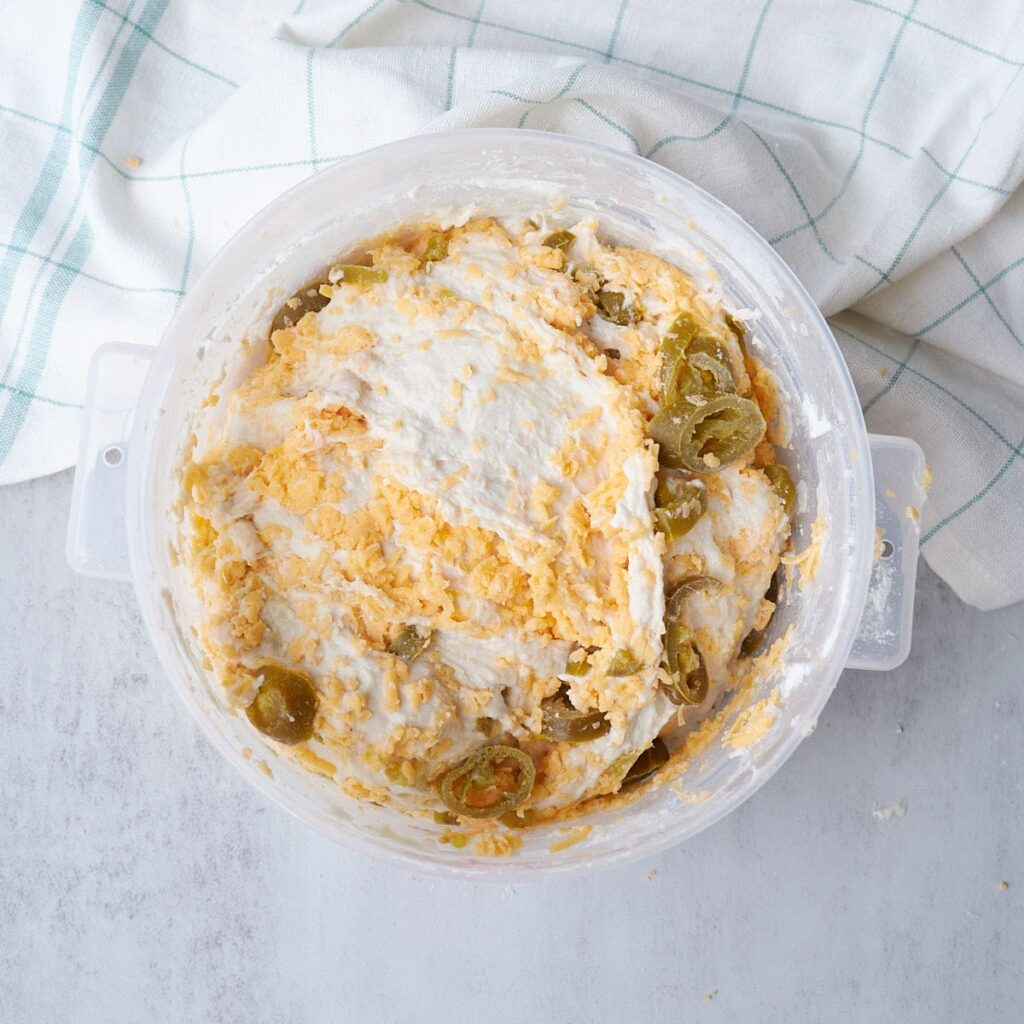 Jalapenos and cheese added to dough during stretch and folds.