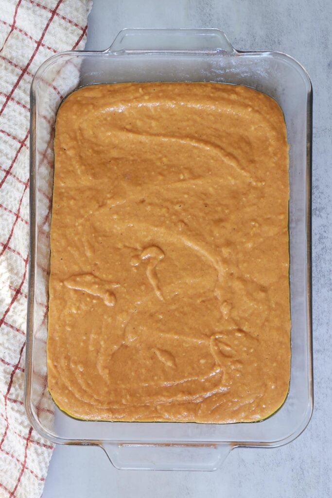 Batter for Sourdough Pumpkin Cake added to a 9x13 baking pan.