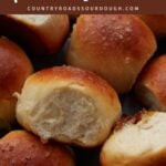 Sourdough Discard Dinner Rolls on a wooden board.