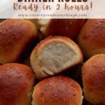 Sourdough Discard Dinner Rolls on a wooden board.