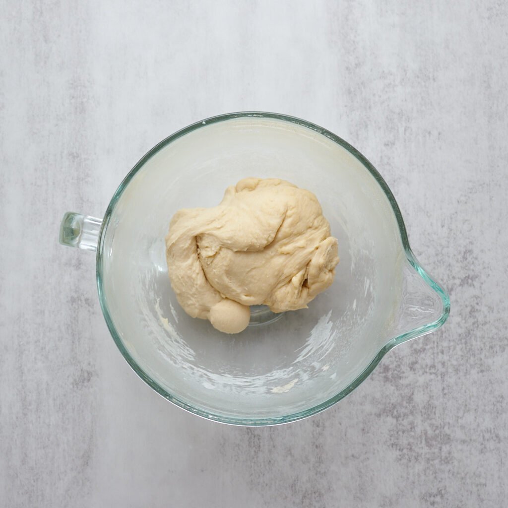 Dough for sourdough apple pull apart bread after being mixed in a stand mixer.