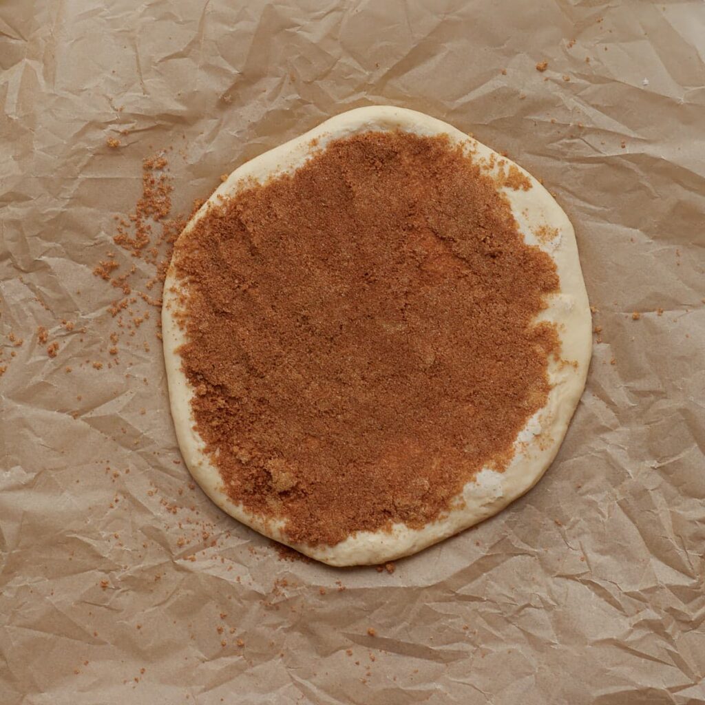 One dough layer with cinnamon sugar mixture for sourdough cinnamon star bread.
