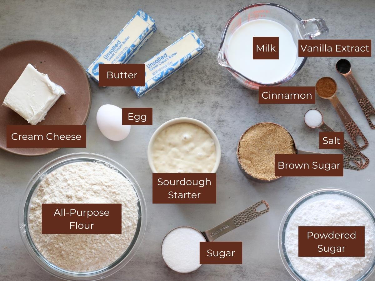 Ingredients for Sourdough Cinnamon Star Bread on a grey background.