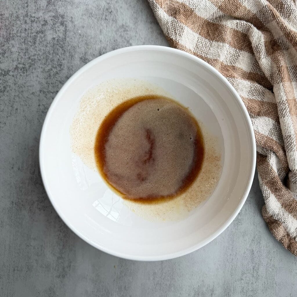 brown butter for sourdough peanut butter cookies in a white bowl.