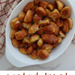 Pinterest pin of close up of sourdough discard pretzel bites in a white bowl on a counter and a towel in the top left corner.