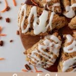 7 Sourdough Carrot Cake Scones arranged in a circle on a round wooden board.