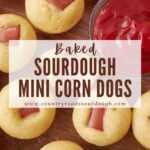 Sourdough mini corn dogs on a wooden surface next to a small bowl of ketchup.