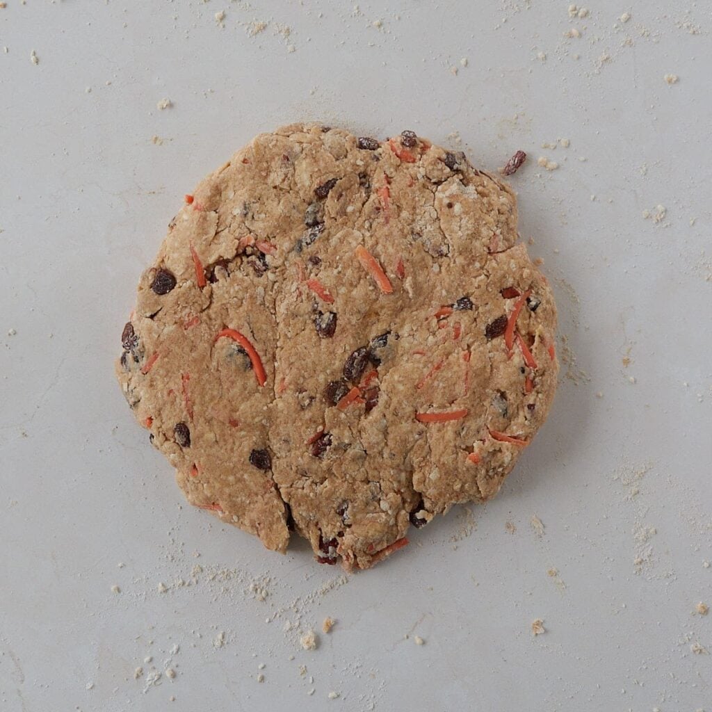 Sourdough Carrot Cake Scone dough in a round shape.