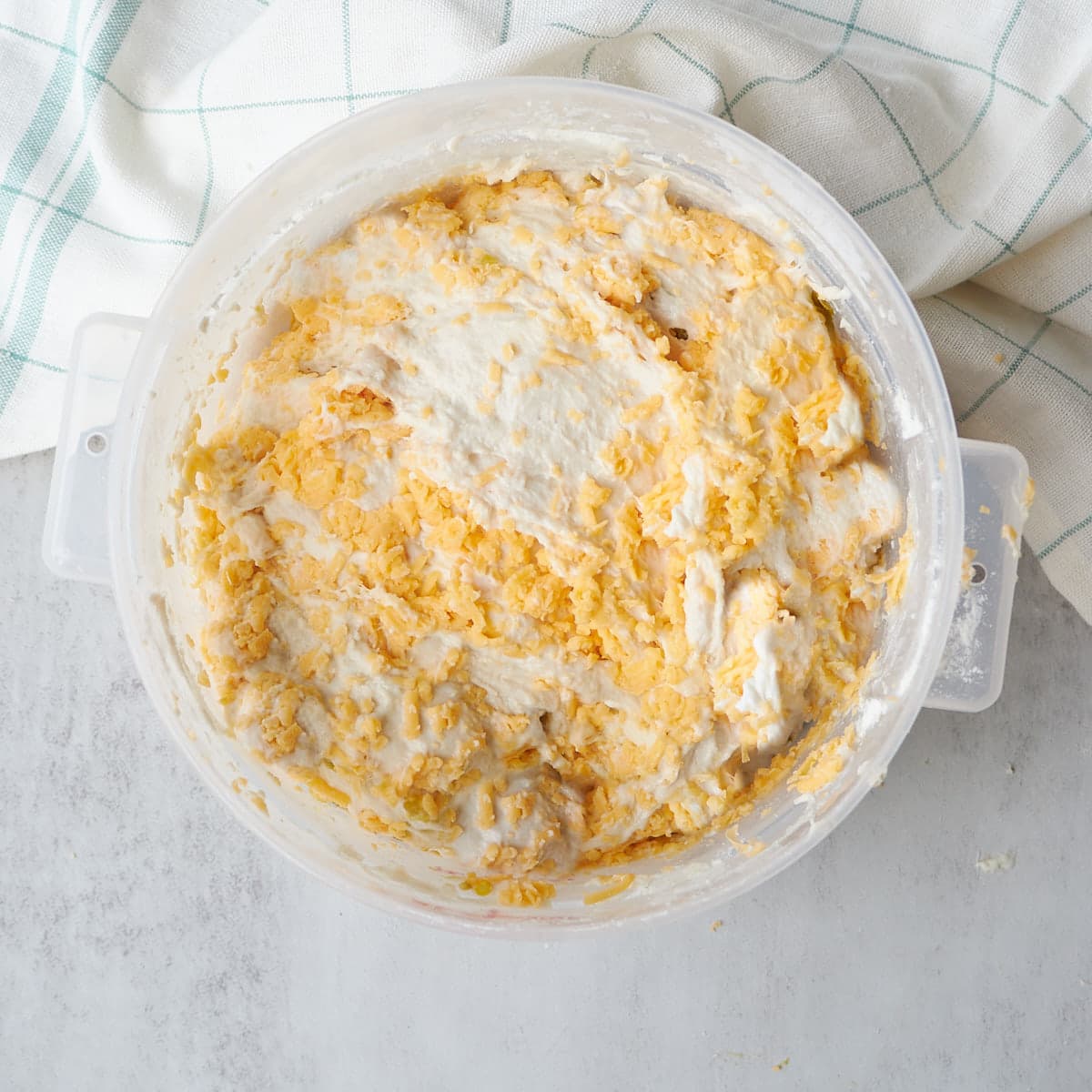 Sourdough pretzel bread dough after incorporating the shredded cheese during the second stretch and fold.