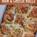 Freshly baked Sourdough Ham and Cheese Rolls in a 9x13 pan.