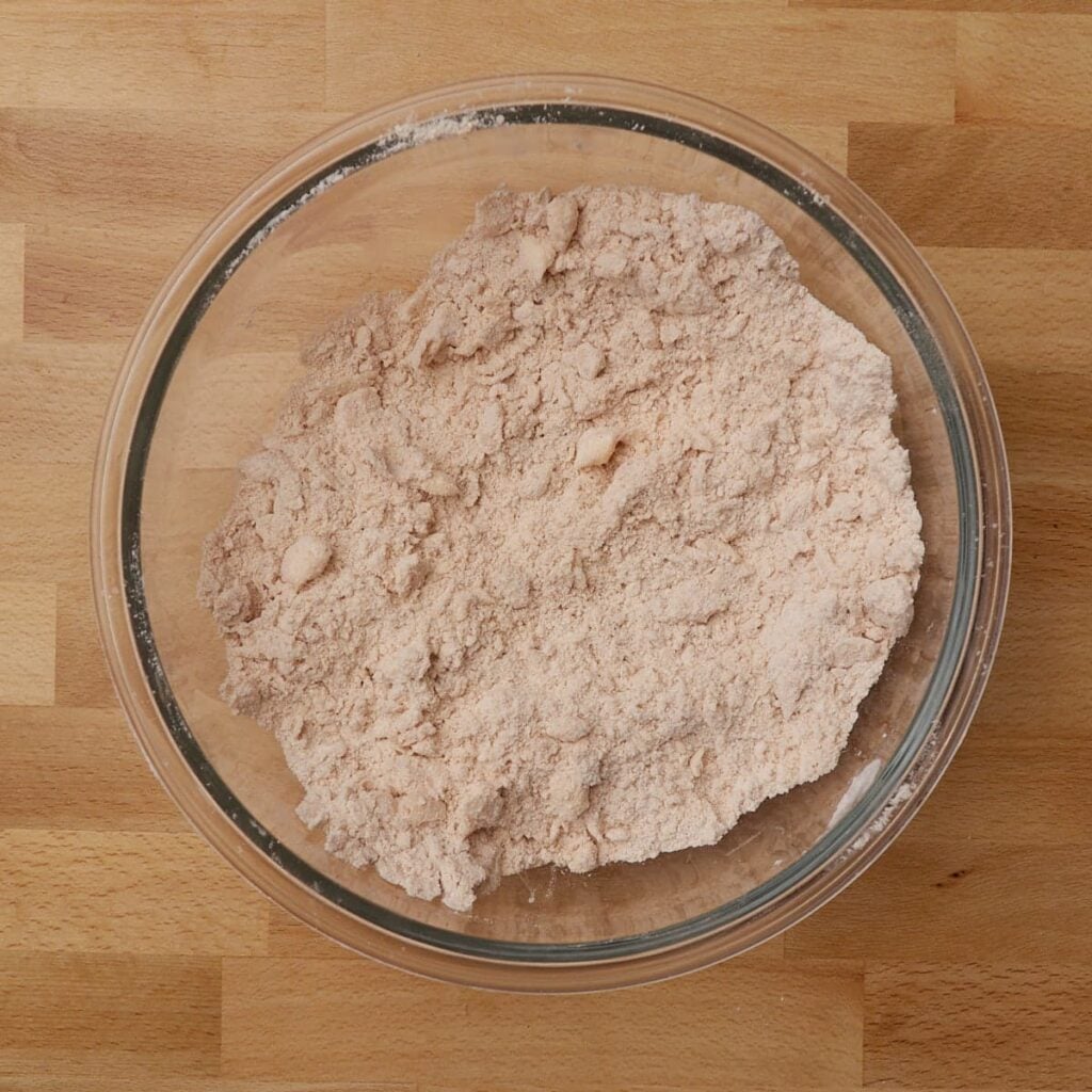 Butter added to dry ingredients for sourdough animal crackers.