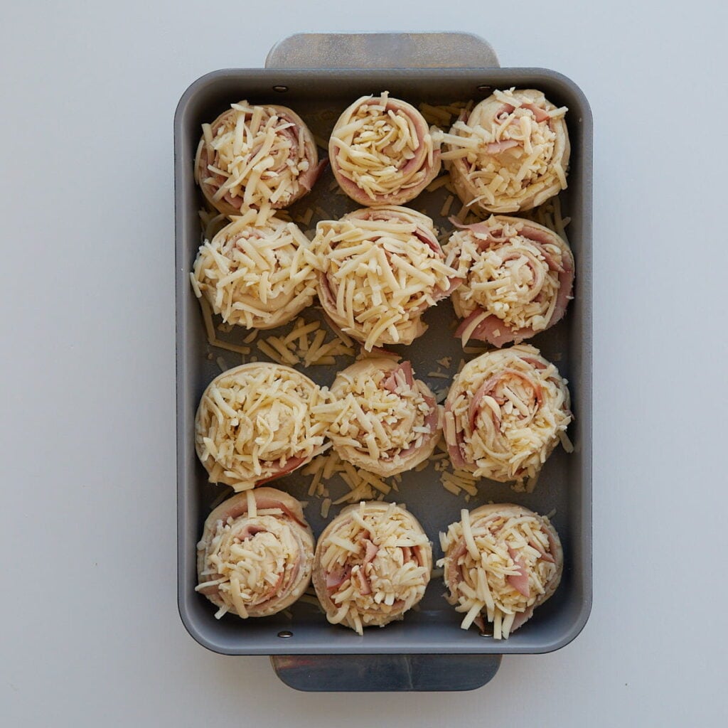 Sourdough Ham and Cheese Rolls in a 9x13 pan before the second rise.