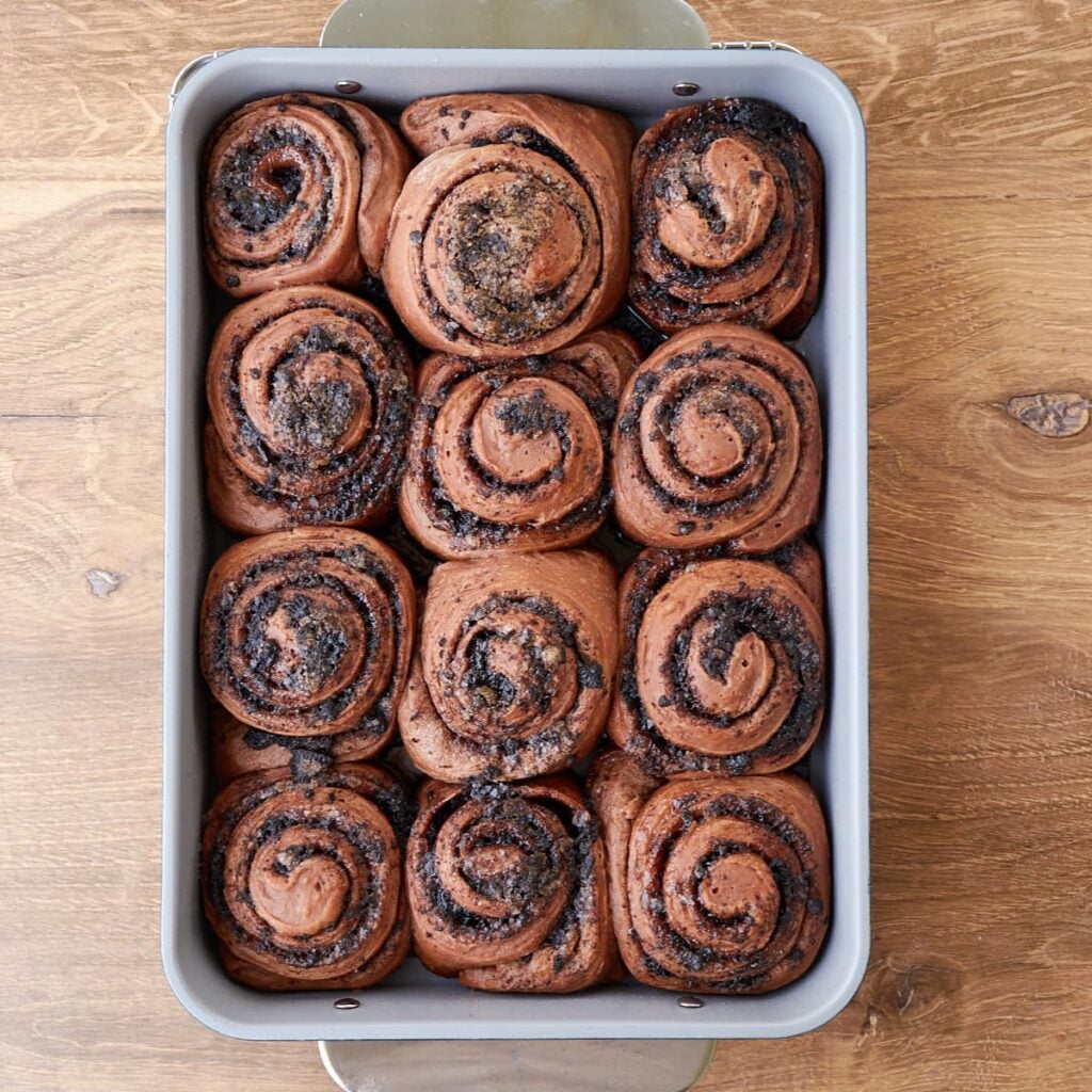 Freshly baked Cookies and Cream Sourdough Chocolate Rolls in a 9x13 pan.