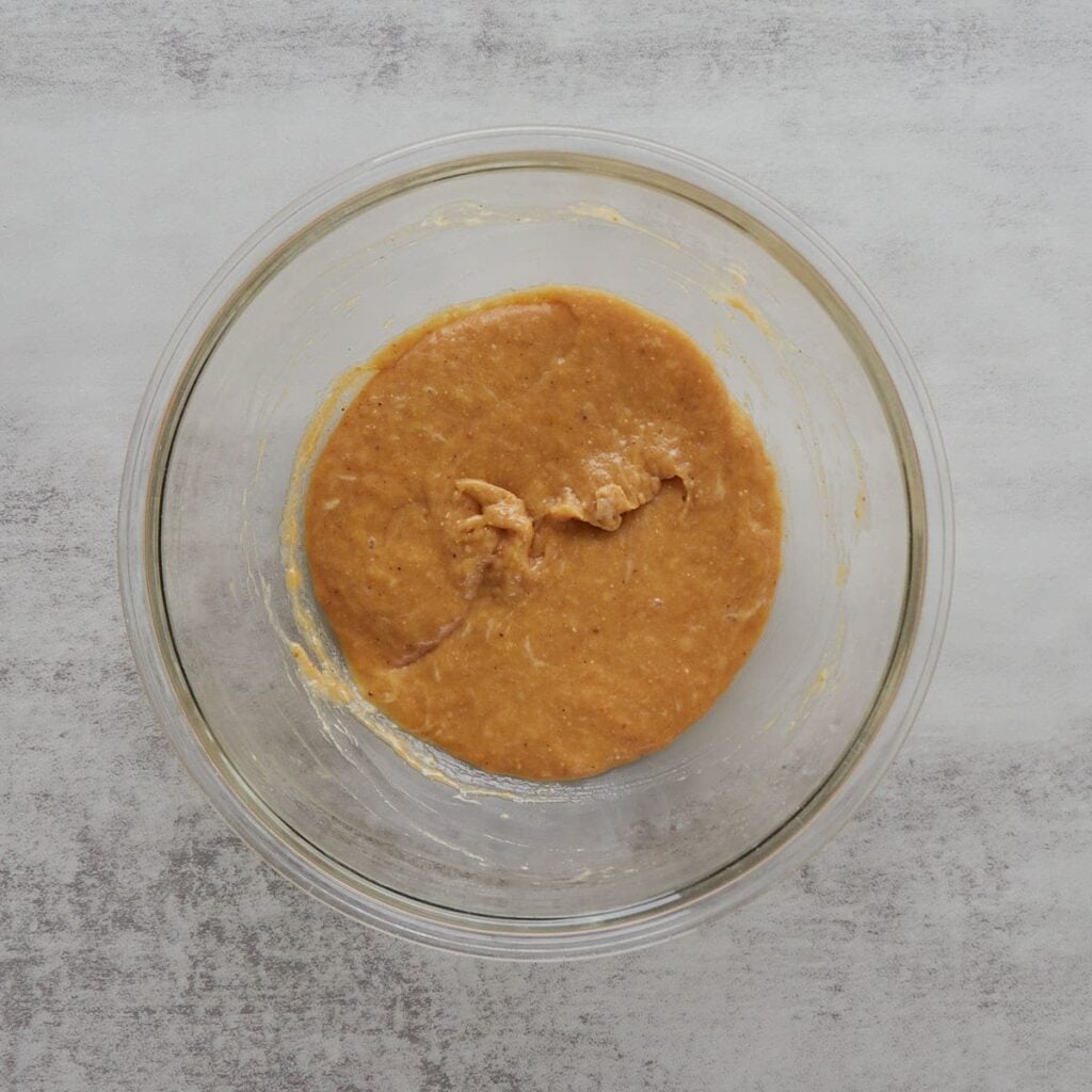 Wet ingredients for sourdough granola bars in a clear bowl.