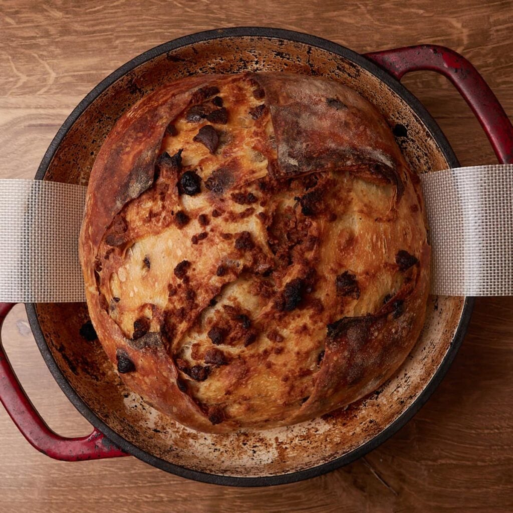 Freshly baked S'mores Sourdough Bread in a bread oven before adding the marshmallows.