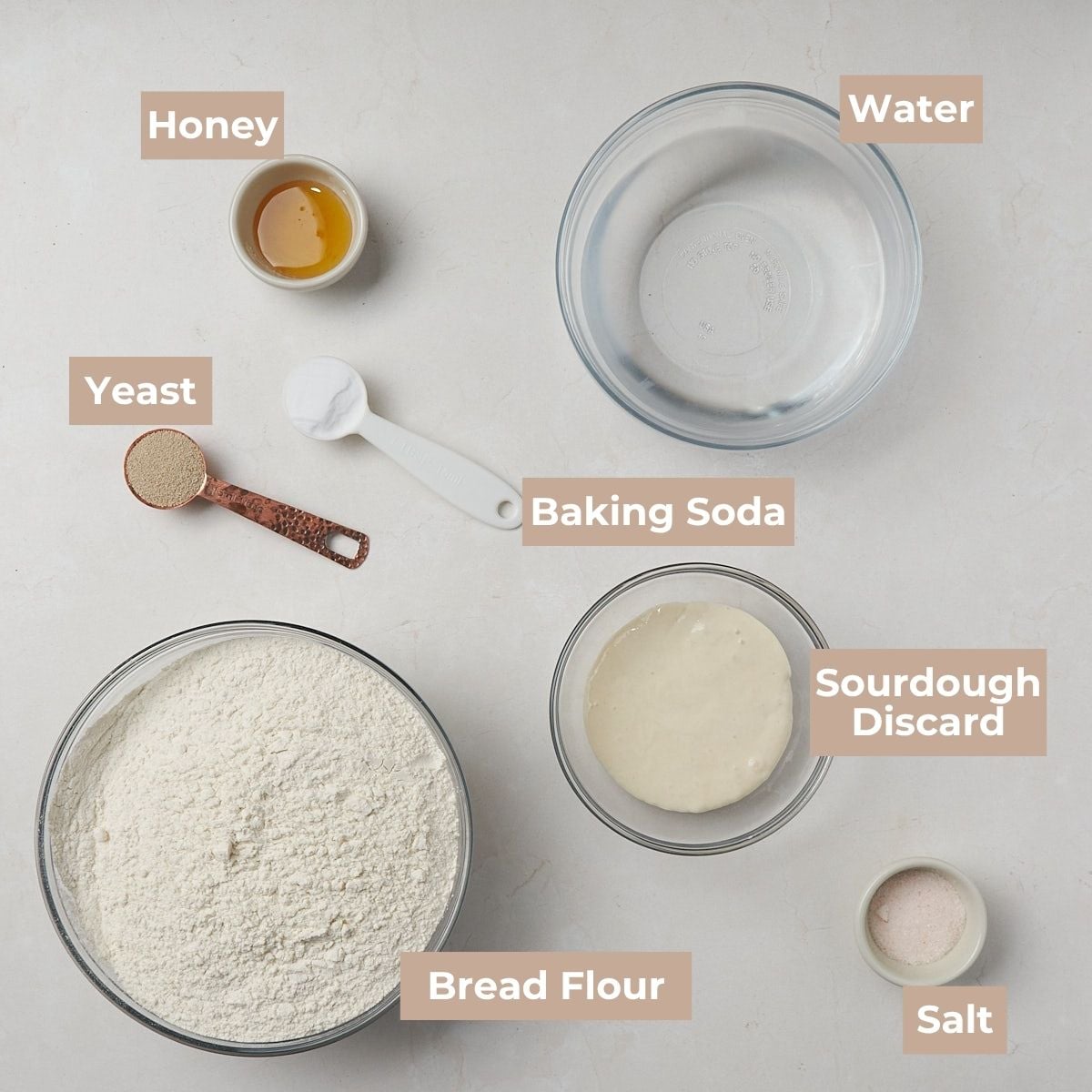 Ingredients for Sourdough Discard Bagels on a white background.