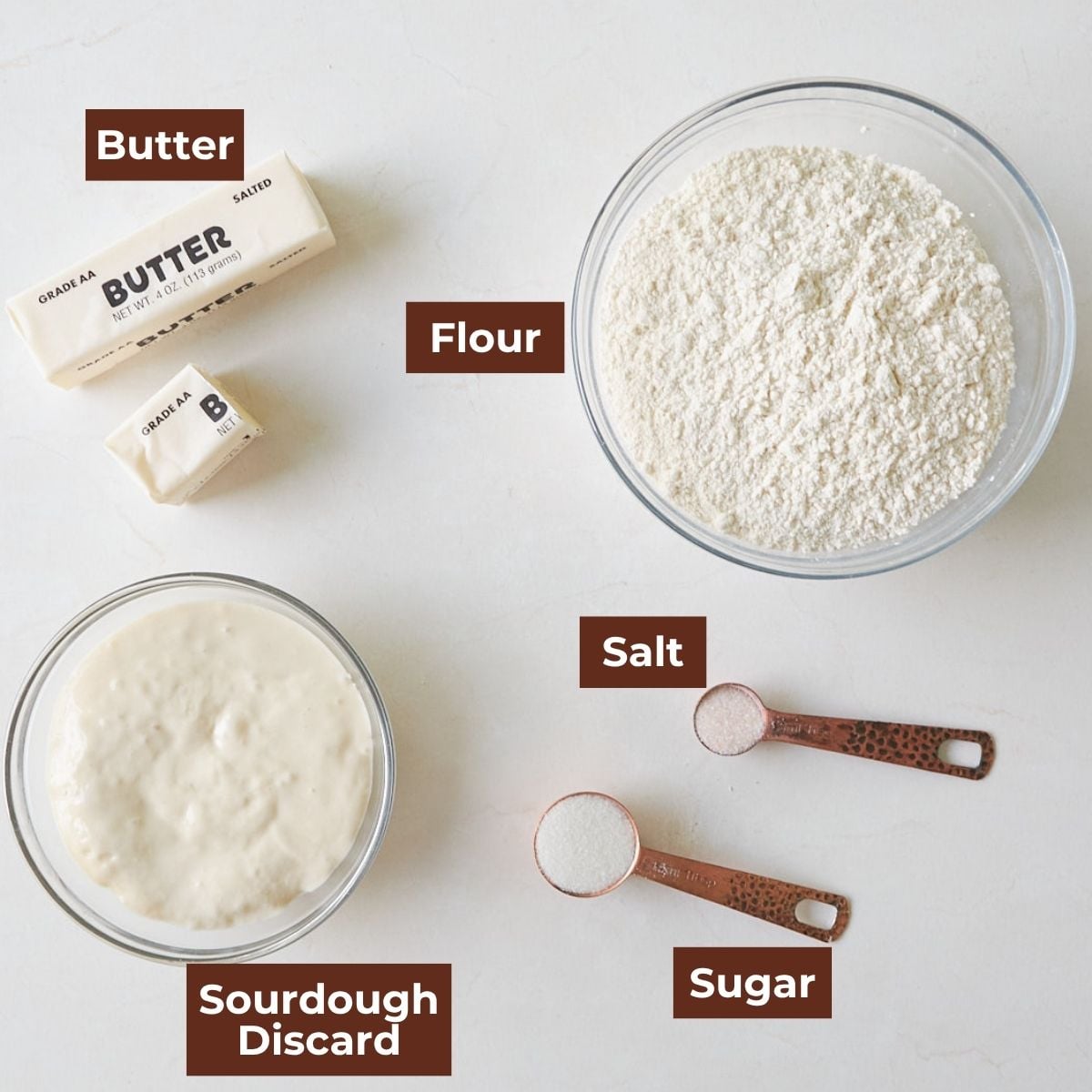 Ingredients for Sourdough Discard Pie Crust in clear bowls on a white background. 