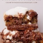 Two Sourdough S'mores Cookie Bars stacked on top of each other.