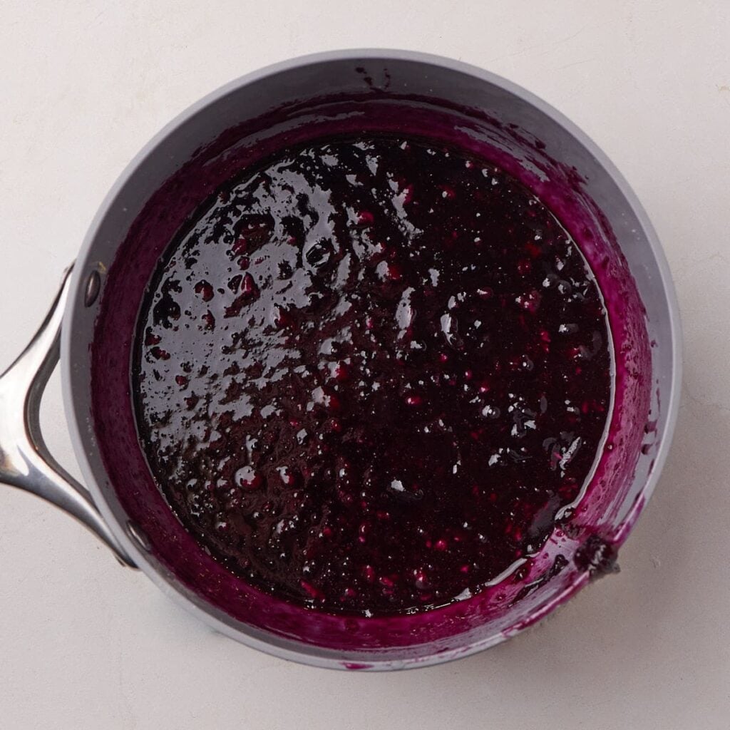 Blueberry filling in a pan for the Lemon Blueberry Sourdough Rolls.
