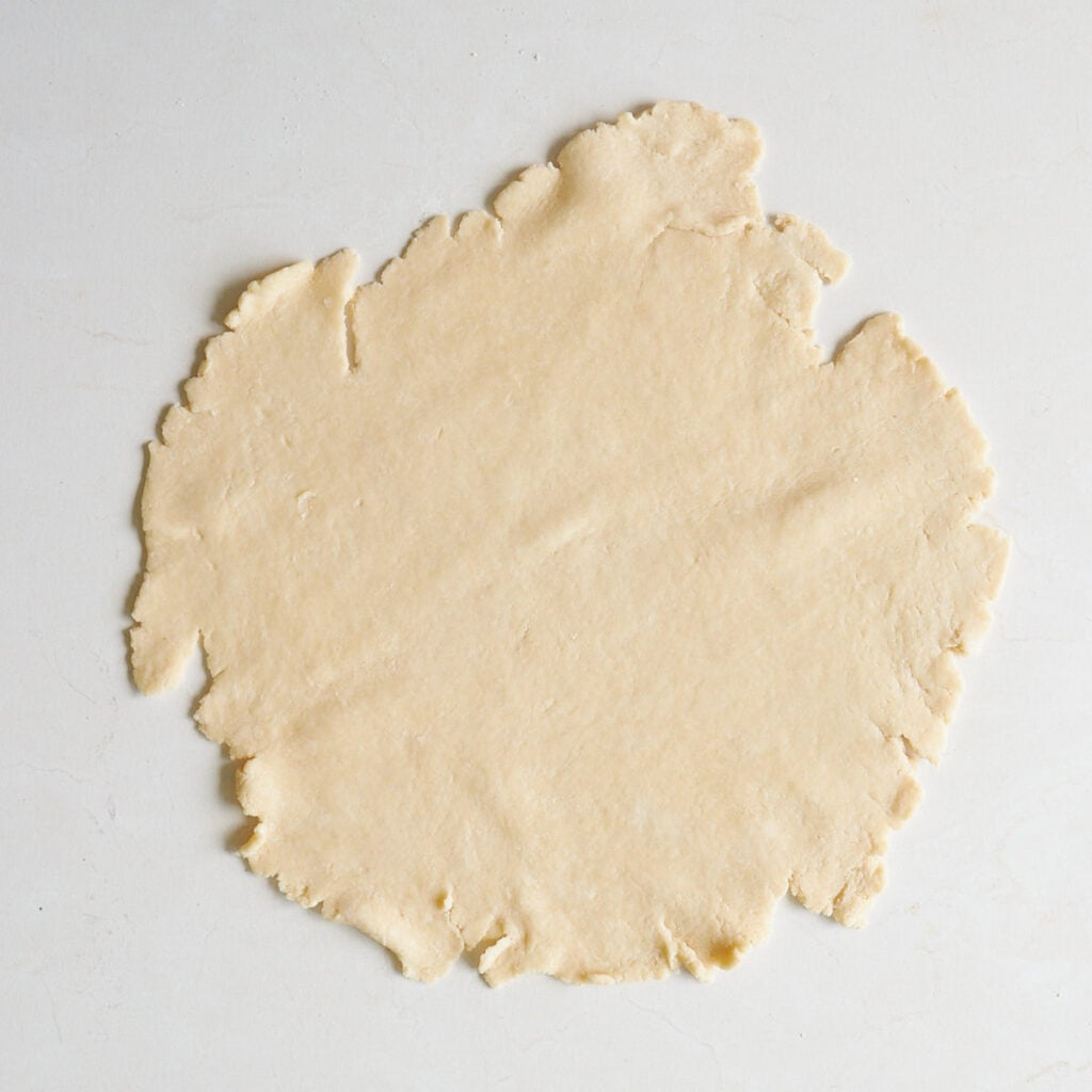 Sourdough pie dough rolled out into a 12 inch circle.
