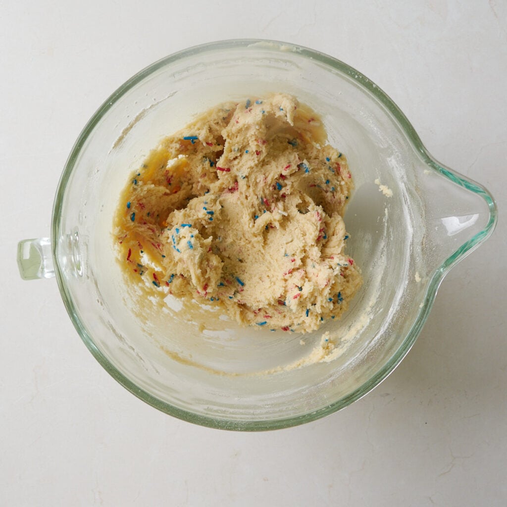 Sprinkles added to the cookie dough for Sourdough Sprinkle Cookies.