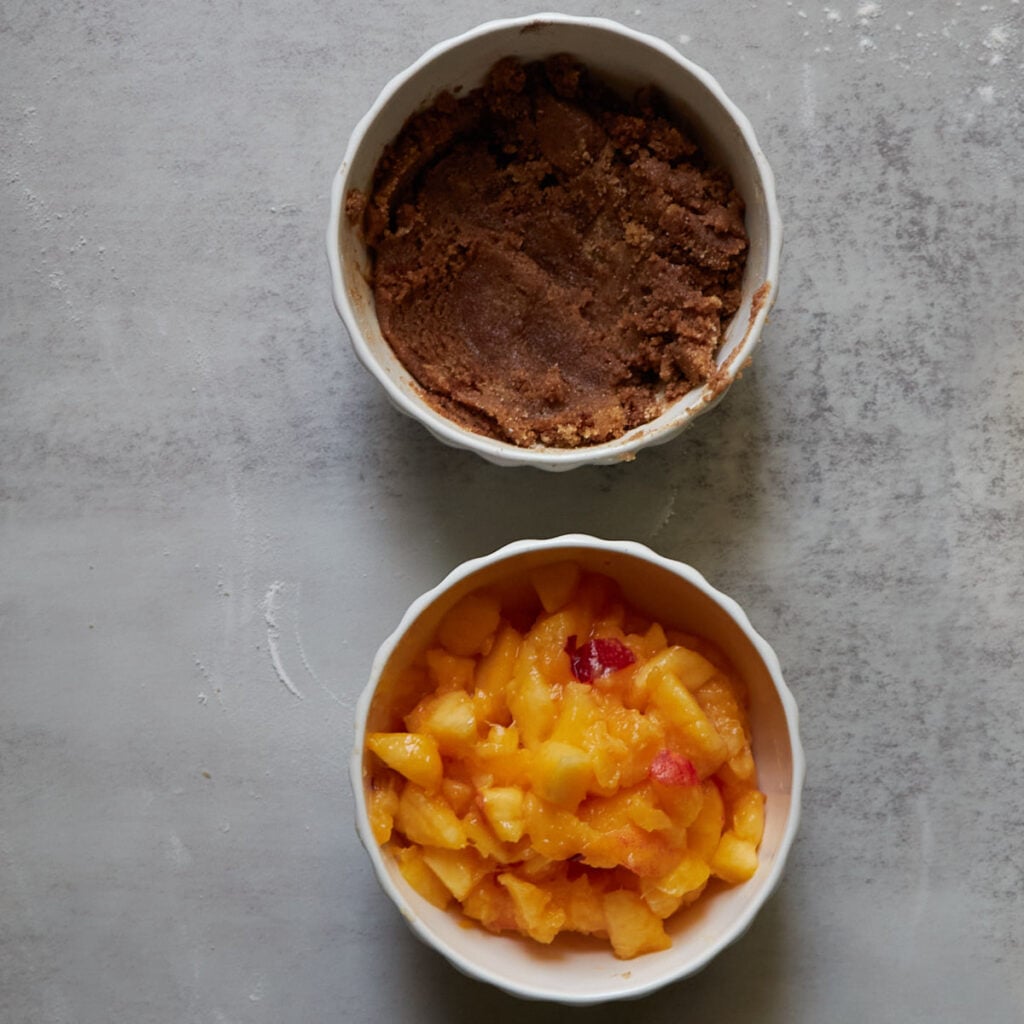 Peach and brown sugar filling for Sourdough Peach Pull-Apart Bread in white bowls.