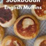 Sourdough English Muffins on a cooling rack.